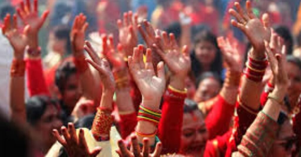 Women preparing to eat on the occasion of Haritalika Teej